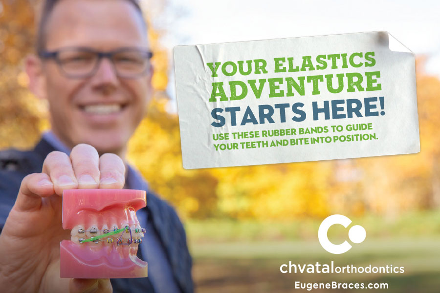 Orthodontist holding dental model with elastics guide, outdoor setting, promotional material for Chvatal Orthodontics.